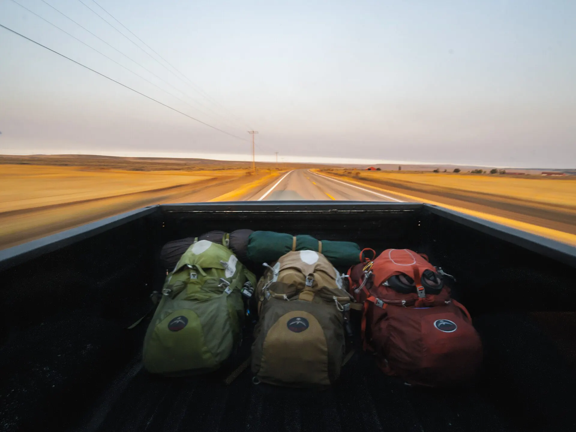 The road seen from the back of a pickup truck